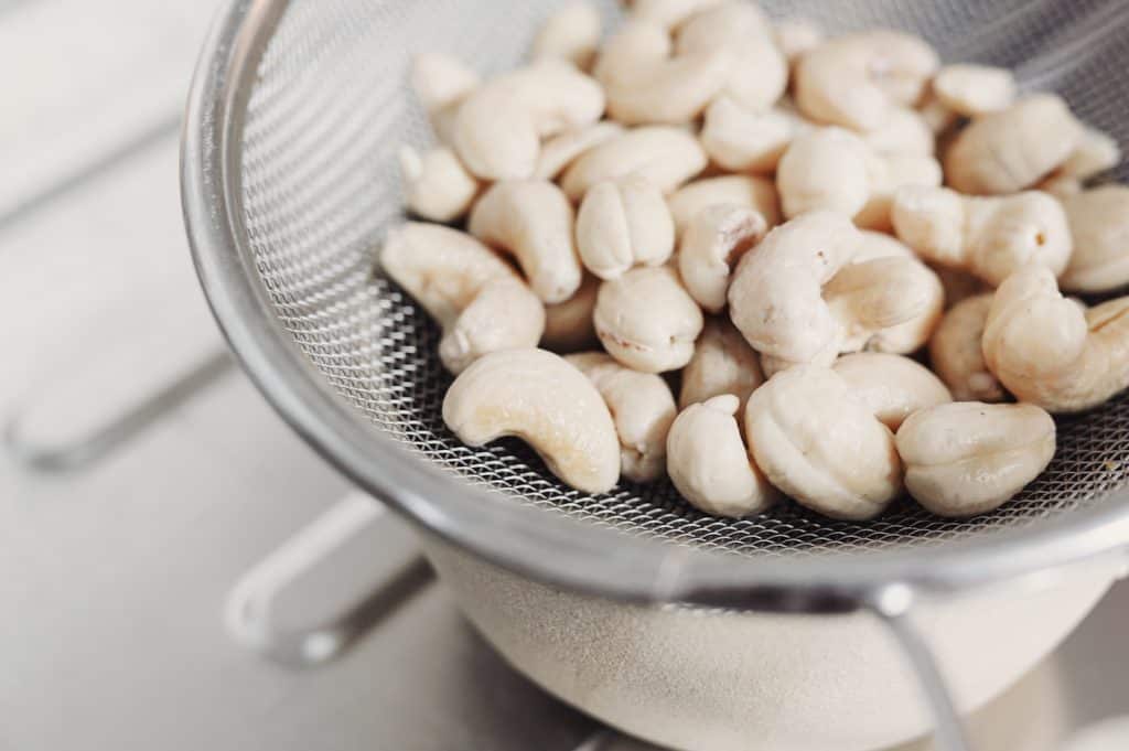 Cashews in a strainer