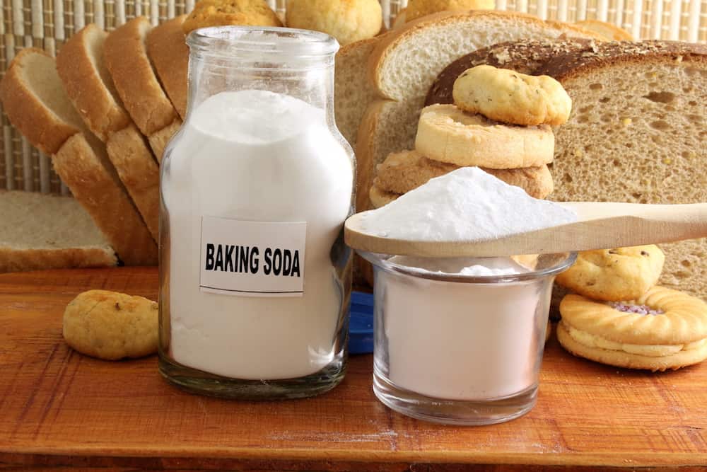 baking soda next to cookies and bread